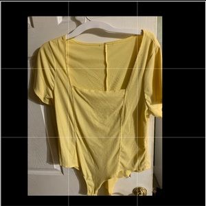 Yellow body suit